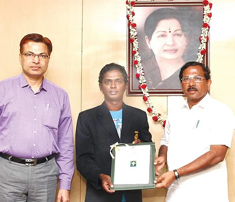 Shanti Soundarrajan receiving the appointment order from Minister K Pandiarajan on Tuesday