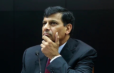 Governor of Reserve Bank of India (RBI), Raghuram Rajan, listens to a question during a press conference to declare the bi-monthly monetary policy statement in Mumbai. (AP)