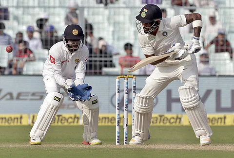 Lokesh Rahul (R) plays a shot during the fourth day of first test cricket match against Sri Lanka | AP