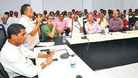 GVMC commissioner M Hari Narayanan (sitting) addressing the members of Resident Welfare Associations in Visakhapatnam on Sunday | Express