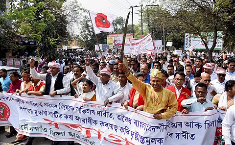 File photo of Activists of All Assam Students' Union (AASU) taking out a Satyagrah rally in Nagaon district of Assam in protest against alleged vandalisation of AASU office at Silapathar by the members of a Bengali organisation. (PTI)