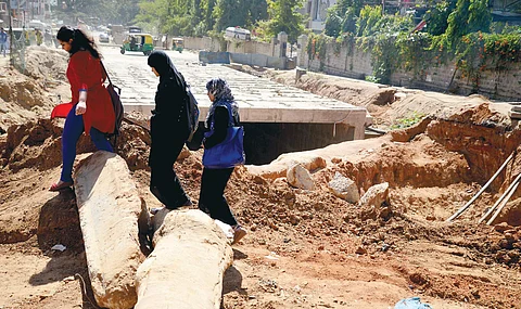 The work on underpass near Vivekananda College has been posing a hurdle for motorists and pedestrians | express