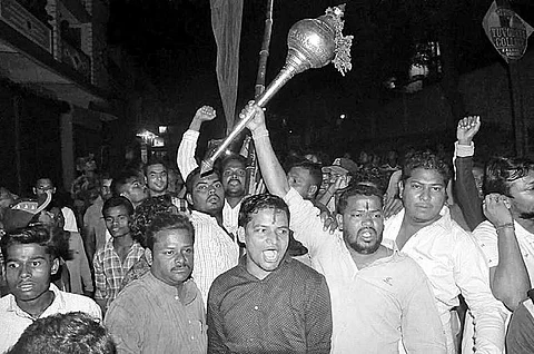 HJSS members on their way to install Hanuman flag at Zilla School Chowk | Express
