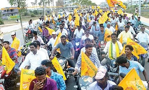 A bike rally being taken out to accord a grand welcome to transport and BC welfare minister K Achannaidu in Srikakulam on Monday | Express