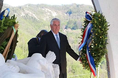 U.S. Secretary of State Rex Tillerson lays a wreath at a memorial in Santa' Anna di Stazzema, a site of Nazi atrocities where 560 civilians, including some 130 children, were killed during World War II, April 10, 2017. AP