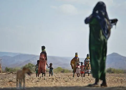 Women arrive at a local health centre with their children to get food rations near Lokitaung in northern Kenya's Turkana county where a biting drought has ravaged livestock population on March 21, 2017. (AFP)