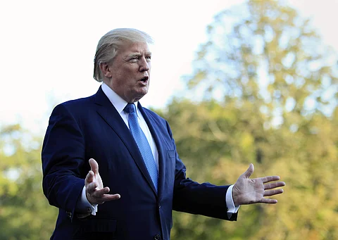 President Donald Trump speaks to reporters upon his return to the White House in Washington, Sunday, Sept. 24, 2017. Citizens of eight countries will face new restrictions on entry to the U.S. under a proclamation signed by Trump on Sunday. (Photo | AP)