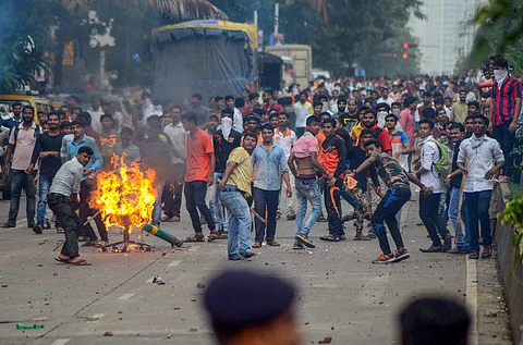 Maratha Kranti Morcha protesters pelt stones at police personnel during their statewide bandh called for reservations in jobs and education in Navi Mumbai. (File photo| PTI)