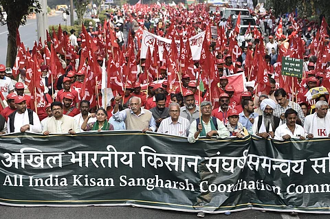 All India Kisan Sangharsh Coordination Committee AIKSCC members and farmers arrive for a two-day rally to press for their demands including debt relief and remunerative prices for their produce in New Delhi Thursday Nov. 29 2018. | PTI