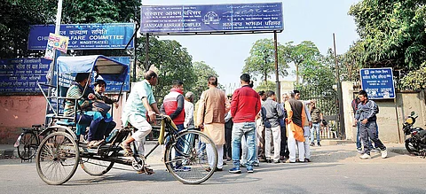 Locals gather outside the govt-run Sanskar Ashram from where nine girls went missing in New Delhi. (EPS / Naveen Kumar)