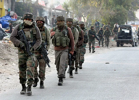 Security personnel take positions during a militants attack at Sunjwan Army camp in Jammu on Saturday. | PTI