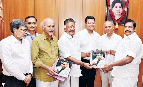 Chief Minister Edappadi K Palaniswami handing over the first copy of a book ‘Jaya: An Incredible Story’ brought out by TNIE to Deputy Chief Minister O Panneerselvam after releasing it, as (from right) TNIE Group CMD Manoj Kumar Sonthalia, GM-TN Siddharth 