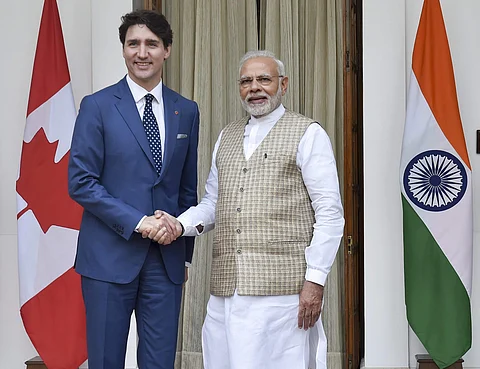 Prime Minister Narendra Modi shakes hands with his Canadian counterpart Justin Trudeau before their meeting at Hyderabad House in New Delhi on Friday | PTI