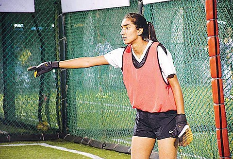 Afshan, goalkeeper and captain of J&K team, in action on the field; (inset) throwing stones at policemen | Arun Jetlie