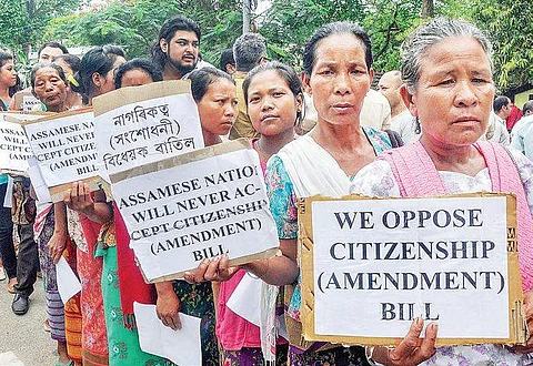 Members of different organisations hold placards against a Joint Committee hearing on the Citizenship (Amendment) Bill at the Assam Administrative Staff College, Khanapara, in Guwahati  | PTI