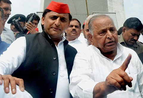 Former UP chief minister Akhilesh Yadav with father Mulayam Singh Yadav. (PTI file photo)