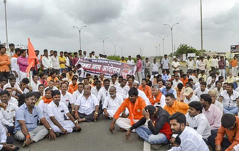 Maratha Kranti Morcha activists block the Pune-Solapur highway during a protest demanding for reservations in jobs and education in Solapur Maharashtra on Wednesday Aug 1 2018. | PTI