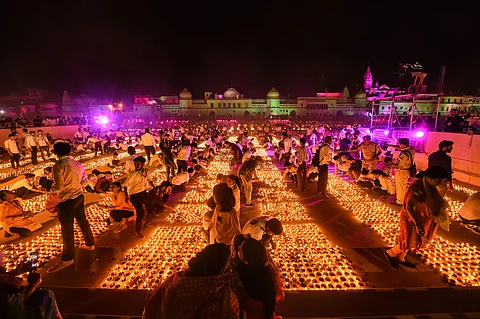 The Uttar Pradesh government on Saturday broke its own Guinness World Record for the largest display of oil lamps by lighting a total of 5.5 lakh diyas or earthen lamps in Ayodhya. (Photo | PTI)