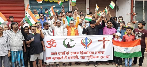 People of all religions took out an amity procession at Bihar's Muzaffarpur on Saturday after the SC judgement. (Photo | EPS)