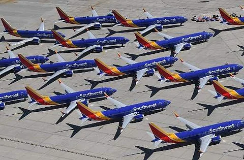 In this file photo taken on March 28, 2019 Southwest Airlines Boeing 737 MAX aircraft are parked on the tarmac after being grounded, at the Southern California Logistics Airport in Victorville, California.