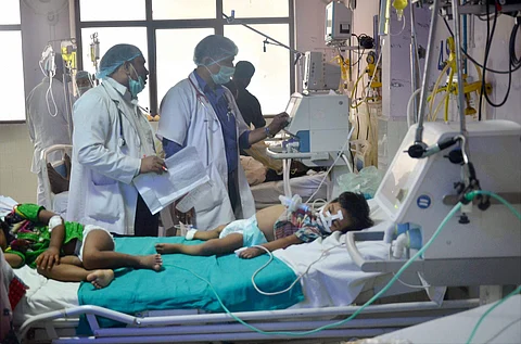 Children admitted in the Encephalitis ward of the state-run Baba Raghav Das Medical College. (Photo | PTI)