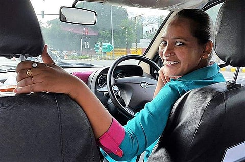 Lalita, who has worked as a chauffeur and now trains women to drive professionally, learnt to stand on her feet after acquiring a permanent driving license at 18. (Photo | IANS Twitter)