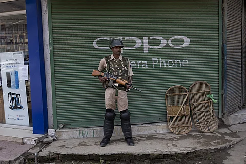 An Indian paramilitary soldier stands guard in Srinagar, Kashmir (File Photo|AP)