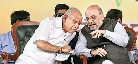 CM B S Yediyurappa and Home Minister Amit Shah during Vivekadeepini  chanting at Palace Grounds in Bengaluru on Saturday | Shriram BN