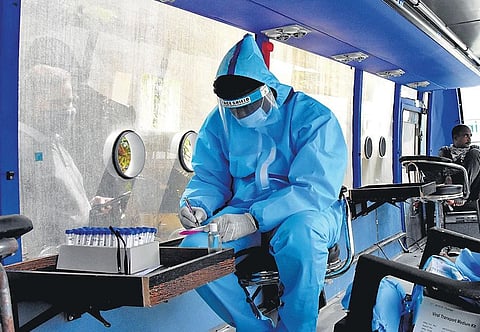 Health workers collect samples for Covid-19. (File Photo | Madhav K)