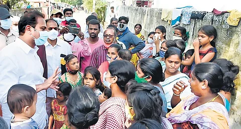 Deputy CM Alla Kali Krishna Srinivas interacting with discharged patients at Turpu Veedhi in Eluru on Sunday | Express