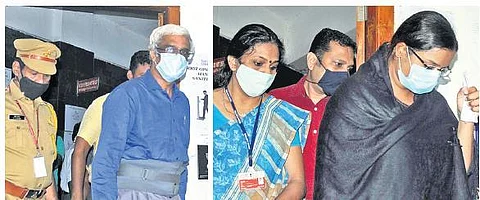 M Sivasankar and Swapna Suresh coming out of the Additional Chief Judicial Magistrate (Economic Offences) Court in Kochi. (Photo | A Sanesh, EPS)