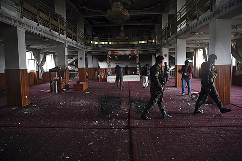 Afghan security personnel and journalists inspect the inside a Sikh house of worship, after an attack in Kabul, Afghanistan, Wednesday, March 25, 2020. (Photo | AP)