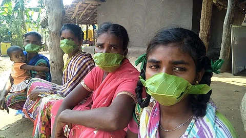 Tribals residing in the agency areas of the district have made face masks out of teak leaves.