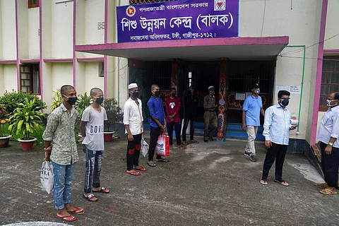 The committee is marking an area that has recorded minimum 60 COVID-19 cases among 100,000 people in last 14 days as a red zone in Dhaka and Chattogram cities. (Photo | AP)