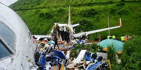 The crashed Air India Express flight at the Karipur International Airport. (Photo| Manu R Mavelil, EPS)