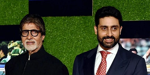 Bollywood star Amitabh Bachchan (L) with his actor son Abhishek Bachchan.