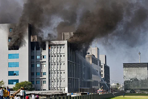 Smoke billows out after a massive fire broke out at the Serum Institute of India, in Pune. (Photo| PTI)