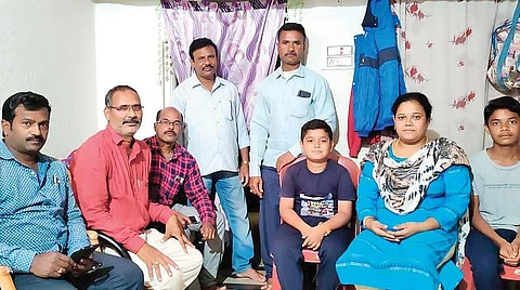 The batchmates with family members of Krishna Rao in Mandasa village | EXPRESS