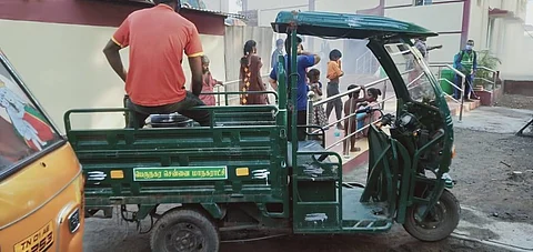Food brought by a garbage collection vehicle being provided at the shelter in Periyamet. (Photo | Express)