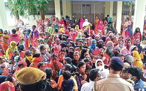 Women activists protesting at the Collectorate on Wednesday. (Photo | Express)