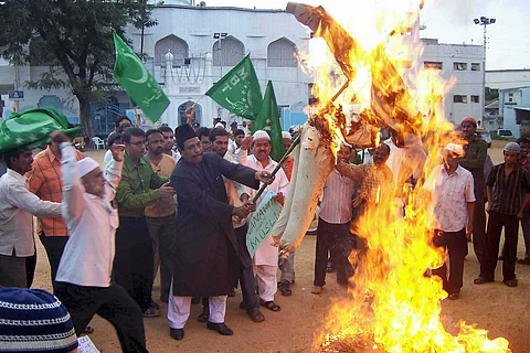 In this file photo, Muslims burn effigy of the then Gujarat Chief Minister Narendra Modi, after the Nanavati Commission report gave him a clean chit in Godhra carnage | PTI