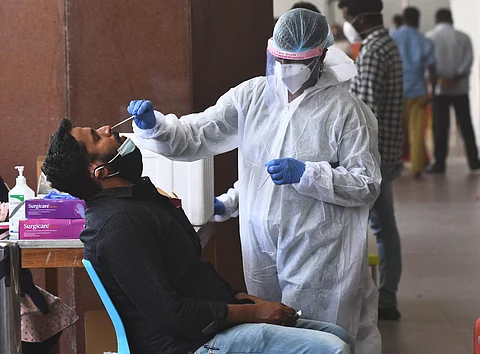 Swab samples being collected from passengers who arrived at Chennai International Airport (Photo | Ashwin Prasath, EPS)