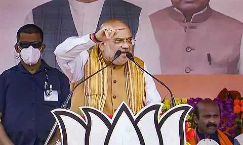 Union Home Minister and BJP leader Amit Shah speaks during an election campaign rally, ahead of West Bengal assembly polls, at Egra in Purba Medinipur district, Sunday. (Photo | PTI)