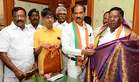 Three nominated BJP MLAs V Saminathan, K.G. Shankar and Selvaganapathy of Puducherry greeting then Chief Minister V Narayanasamy at Puducherry legislative assembly. (File photo | Pattabi Raman/ EPS)
