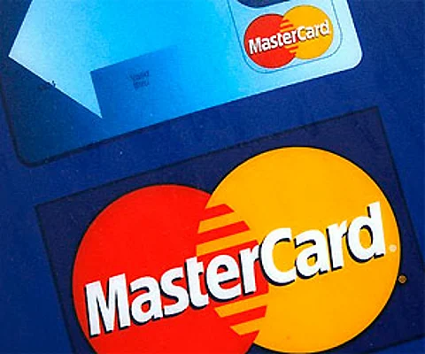 File photo of a sign for MasterCard credit cards is shown on the entrance to a bank, in New York. (Photo | AP)