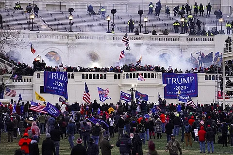 Violent protesters, loyal to then-President Donald Trump, storm the Capitol. (File photo | AP)