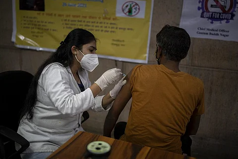 A man receives Covishield vaccine against the coronavirus at a government hospital in Noida, a suburb of New Delhi. (File Photo | AP)