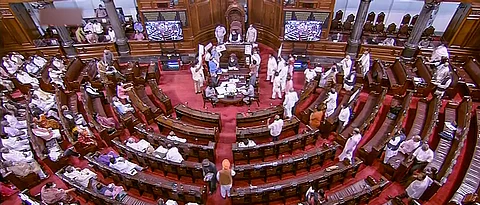 Members protest in the well of the Rajya Sabha during the Monsoon Session of Parliament, in New Delhi (Photo | PTI)
