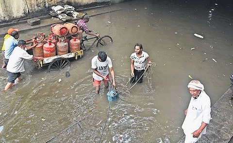 A view of flooded Yamuna Bazar after heavy rains in Delhi.