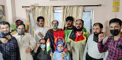 Yasmin Nigar Khan, president of the All India Pakhtoon Jirga-e-Hind, flanked by organisation members and Afghan expatriates in her office at Kolkata, on August 19, 2021. (Photo | Moyurie Som)